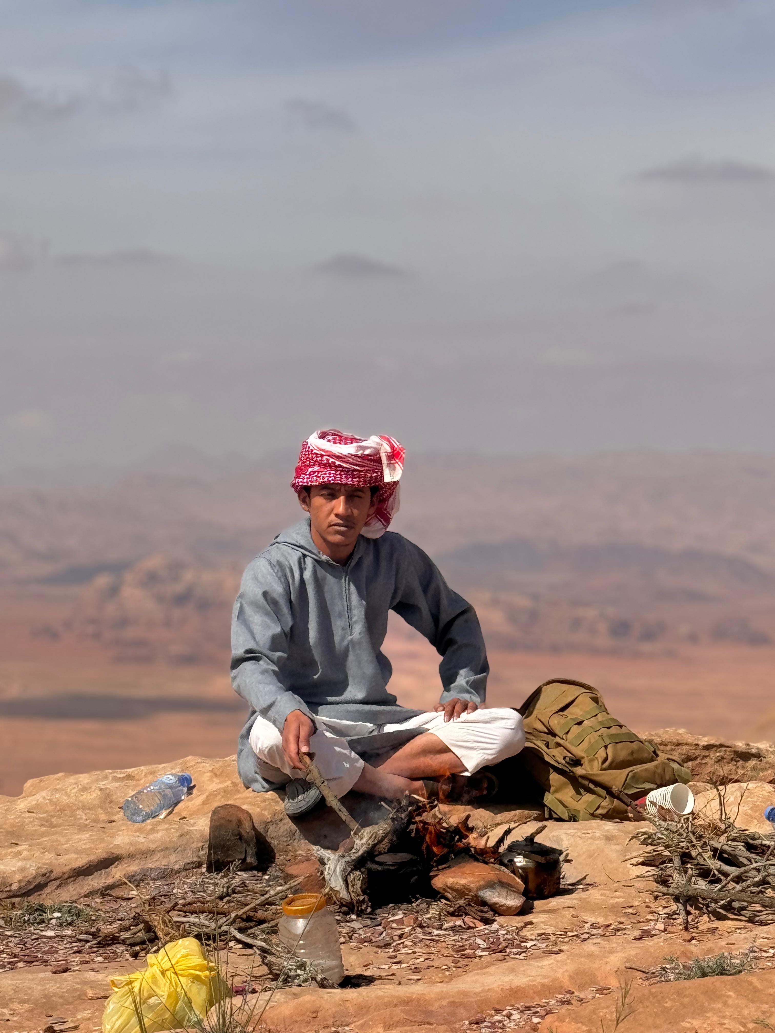 Omar making tea on a mountain